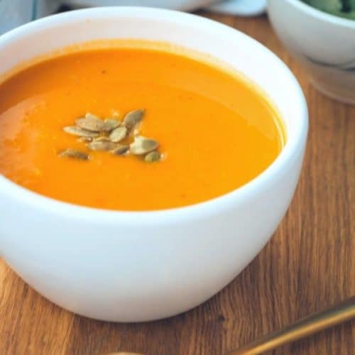 creamy keto paleo aip butternut squash soup recipe with carrots zucchini summer and fall vegetables roasted in the oven on a sheetpan