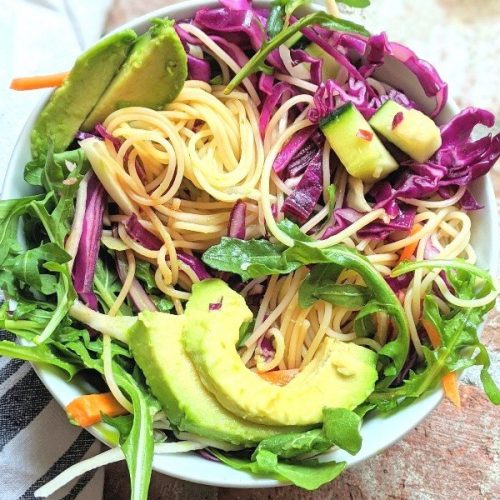 gluten free pasta salad rice noodle recipe asian spring roll salad recipe with avocado arugula cabbage carrots in a lime dressing